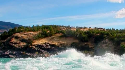 Emerald River Pounds Against the Rocks in New Zealand During Daylight Stock-Footage 327014751