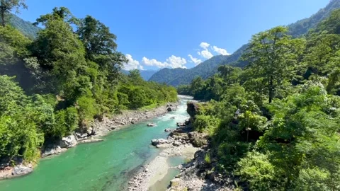 Emerald River Winding Through Forested Mountain Landscape Stock Footage 329175181