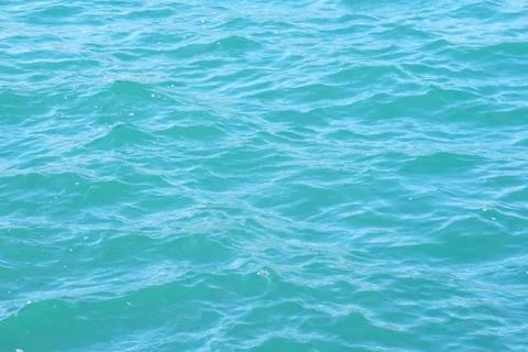 The emerald sea at midday Stock Photos