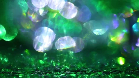 Emerald shimmering glitter background.light reflections in shades of green Video stock 329388347