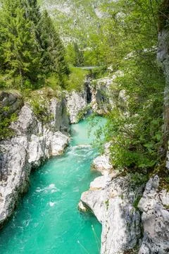 Emerald Soca river flowing through a gorge in Slovenia Stock Photos