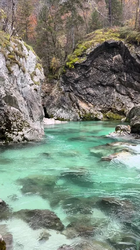 Emerald Soca River with rocky cliffs, Slovenia Stock Footage 335226760