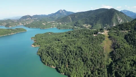 Emerald water and pine covered hills at Lake Plastiras in Karditsa region Greece Stock Footage 340512868
