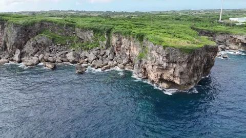 Emerald Waters and Rugged Cliffs – Miyakojima Aerial View 스톡 동영상 312334092
