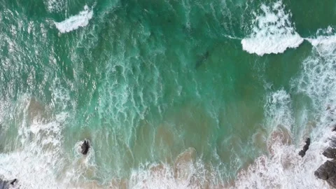 Emerald Waters and White Foam Along Irish Coastline Stock Footage 336631278