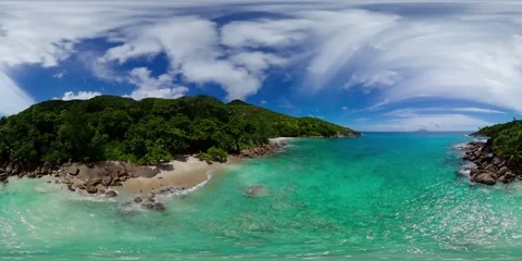 Emerald waves lap against a secluded shore. Mahe, Seychelles. Stock Footage 301287853