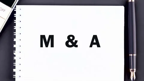 The emergence of the conceptual M and A on a blank piece of notebook paper Stock Footage 314988242