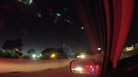 Emergency ambulance responding at night red light reflections Video stock 155759610