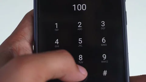Emergency and urgency, dialing 100 on smartphone screen. Stock Footage 336438102