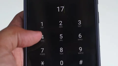 Emergency and urgency, dialing 17 on smartphone screen. Stock Footage 336438095