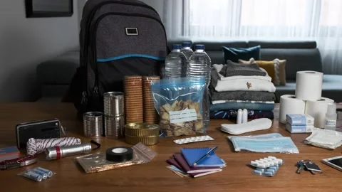 Emergency backpack equipment organized on the table Stock Footage 159206016