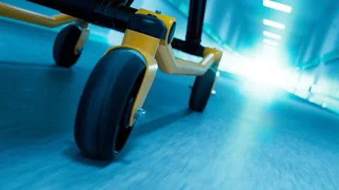 Emergency bed moving fast through a hospital corridor. Looping animation. 4KHD Stock Footage 126258401