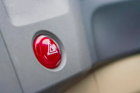 Emergency button in car with black zone. Stock Photos