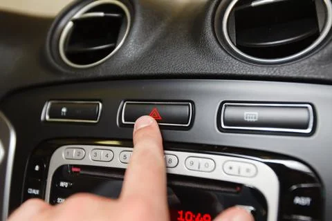 Emergency button on car dashboard Foto stock