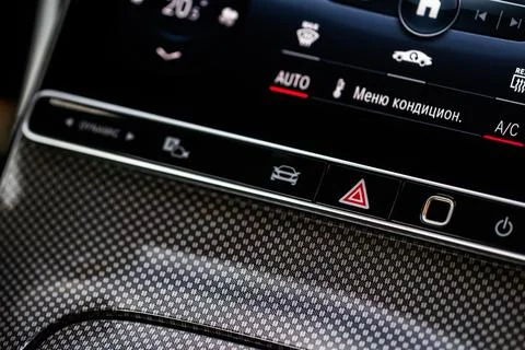 Emergency button in car, hazard light. Close up of car emergency button. Tran Stock Photos
