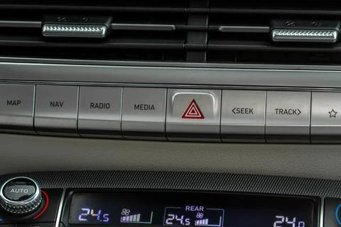 Emergency button in car, hazard light. Close up of car emergency button Stock Photos