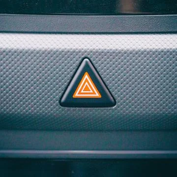 Emergency button on the car panel Stock Photos