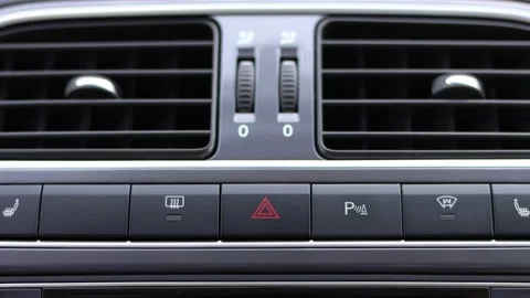 Emergency button flashes on the car dashboard. Stock Footage 145427974