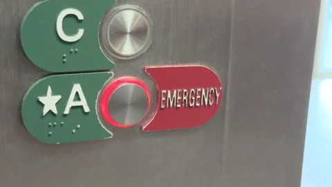Emergency button pressed on elevator panel 4k Stock Footage 323487901