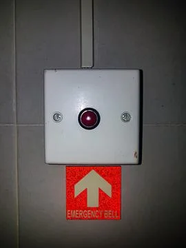An emergency call button installed on the wall in a hospital patient rest roo Stock Photos
