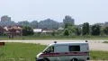 Emergency car ambulance driving through city HD Footage