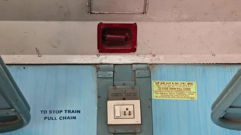 Emergency Chain and Power Socket Inside Indian Train Compartment Stock Footage 323903112