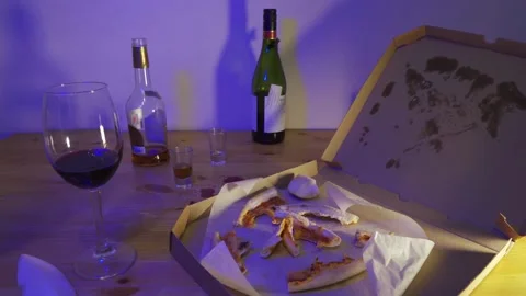 An emergency during a feast. Leftover pizza in the box. Stock Footage 233521064