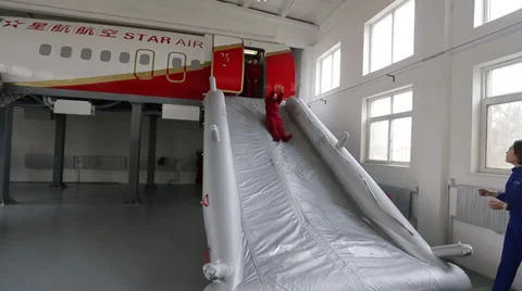 Emergency evacuation from a passenger jet Stock Footage 36393544