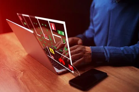 Emergency evacuation plan displayed on a laptop screen for safety in a building Stock Photos