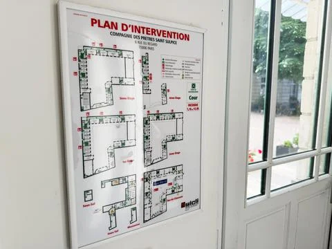 Emergency evacuation plan poster showing Plan d'Intervention building floor.. Stock Photos