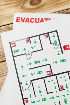 Emergency evacuation plan showing exit routes and assembly points Stock Photos