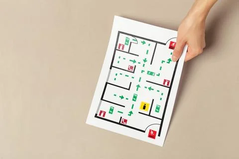 Emergency evacuation plan showing exits and routes for safe evacuation in a Stock Photos
