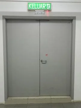 Emergency exit door Stock Photos