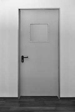 Emergency exit door. Push bar and rail for panic exit Stock Photos