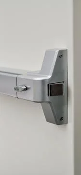 Emergency exit door. Push bar and rail for panic exit Stock-Fotos