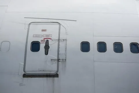 Emergency exit on the plane Stock Photos