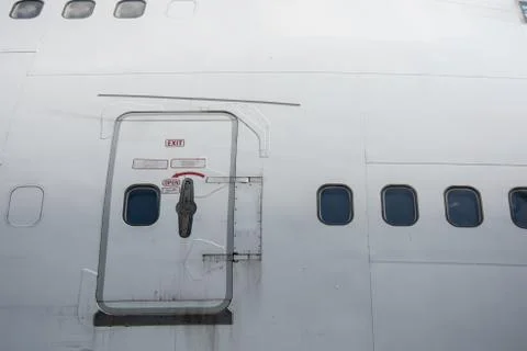 Emergency exit on the plane Stock Photos