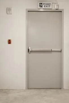 Emergency exit with sign Stock Photos