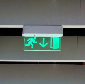 Emergency exit sign Stock Photos