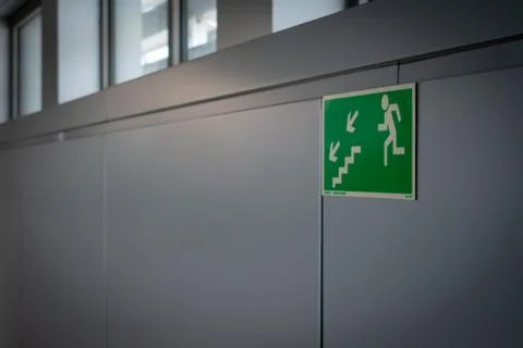 Emergency exit signs Stock Photos