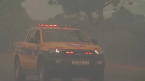 Emergency Fire vehicles arrrive on scene of the fire Stock Footage 313175081