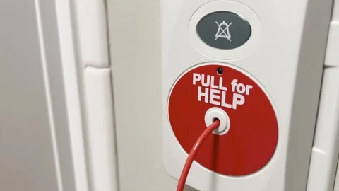 An emergency help pull button on a wall, safety alert system. Video stock 333100282