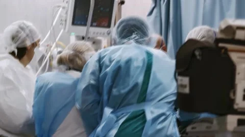 Emergency help for a seriously ill patient. Medical team Video stock 133378211
