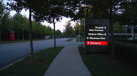 Emergency Hospital Sign At Night Stock Footage