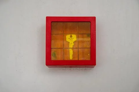 Emergency key in red box mounted on wall 写真素材