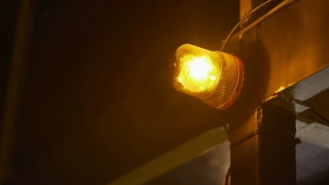 Emergency light or Flashing beacon. Orange flashing on wall  Stock Footage