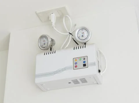 Emergency lighting on the wall Stock Photos