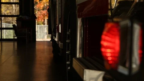 Emergency Lights On Side Of Firetruck Parked In Station Vídeo Stock 125540853