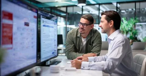 Emergency Manager Analyzes Crisis Software Dashboard For Real-time Risk Monit 写真素材