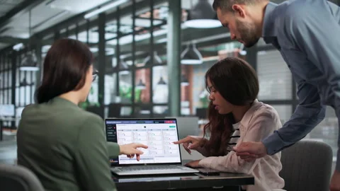 Emergency Manager Leads Team Using Software Stock Footage 347300778